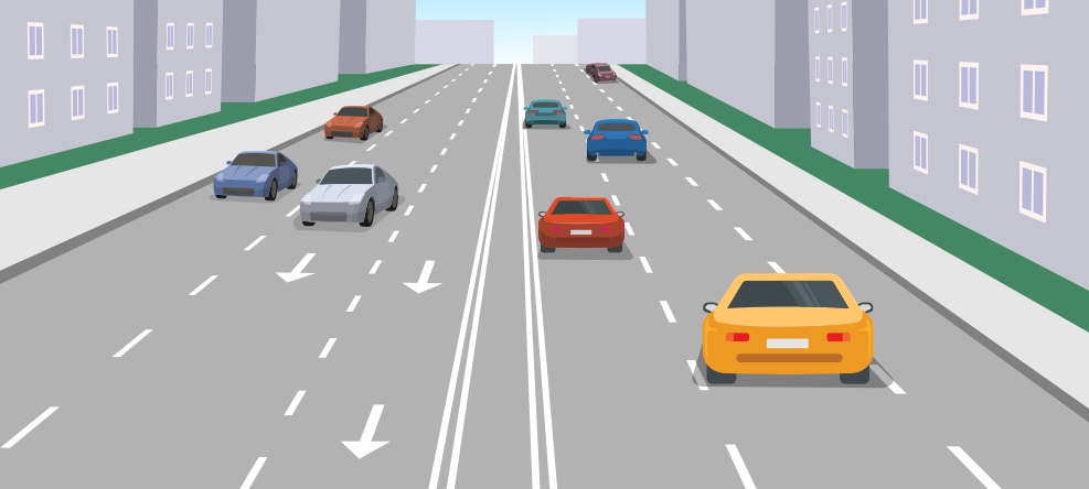 Vía urbana con tres carriles por sentido